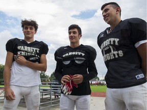 From left, Vasco Repole, Michael Simone and Dario Ciccone, in New Westminster on Sept. 12, play football for the St. Thomas More Knights.