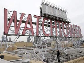 The iconic Watchtower Sign, pictured in 2015 (and since dismantled), was atop the world headquarters of the then-world headquarters the Jehovah's Witnesses in Brooklyn, N.Y.