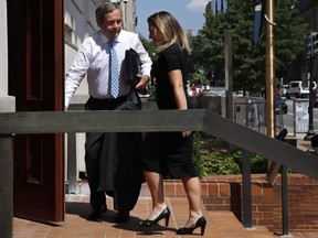 David MacNaughton, left, Canada's Ambassador to the United States, opens the door for Canada's Foreign Affairs Minister Chrystia Freeland after she spoke to the media about trade talks at the Office of the United States Trade Representative in Washington, Wednesday, Aug. 29, 2018.