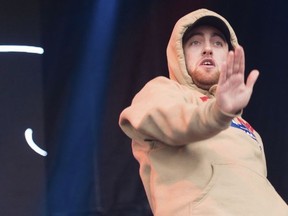 In this Oct. 2, 2016 file photo, Mac Miller performs at the 2016 The Meadows Music and Arts Festivals at Citi Field in Flushing, N.Y. (Scott Roth/Invision/AP, File)