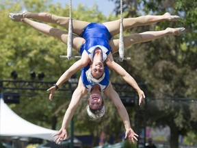Silver Starlets, Glory and Molly, perform an aerial acrobatic display at the PNE Festival stage in Vancouver on Sept. 1.
