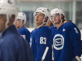 Jay Beagle (83) checks out a camp practice, but all eyes have been on the Stanley Cup champion.