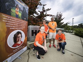 From left to right Chloe Goodison, Phyllis Webstad, Luke Dandurand, Nathan Piasecki, at Yorkson Creek Middle School. Chloe Goodison and her friend Nathan Piasecki are bringing Orange Shirt Day to their school in Port Moody. Phyllis Webstad, who created the day in 2013, recently published a book about it and said she's happy the teens are spreading the word.