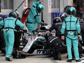 British Formula One driver Lewis Hamilton of Mercedes AMG GP in action at pit line during the Formula One Grand Prix of Russia at the Sochi Autodrom circuit, in Sochi, Russia, Russia, Sunday, Sept. 30, 2018.