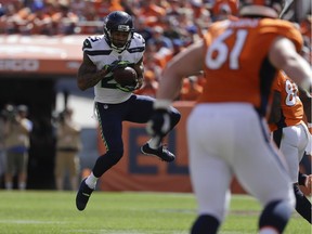 Seattle Seahawks safety Earl Thomas intercepts a pass during the first half of Sunday's NFL season opener against the Denver Broncos on Sept. 9, 2018, in Denver.