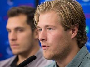 Vancouver Canucks forward Brock Boeser, front right, speaks as Bo Horvat listens during a news conference ahead of the NHL hockey team's training camp, in Vancouver, on Thursday September 13, 2018.