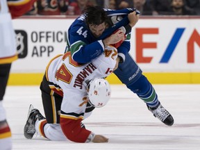 Erik Gudbranson got the better of Travis Harmonic in a retribution bout Wednesday at Rogers Arena.