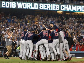 The Boston Red Sox celebrate their 5-1 win over the Los Angeles Dodgers in Game Five to win the 2018 World Series at Dodger Stadium on October 28, 2018 in Los Angeles, California.