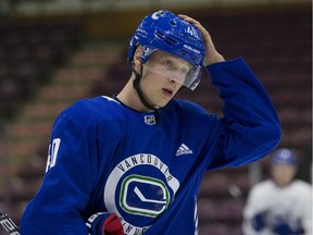 A Calgary radio host is asking listeners to name the finishing move that injured Canucks forward Elias Pettersson.