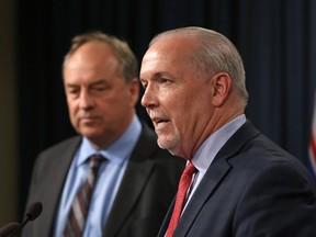 Premier John Horgan and Green Party Leader Andrew Weaver speak to media in early October.