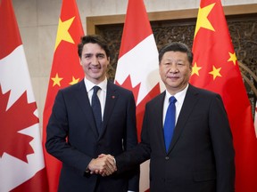 Prime Minister Justin Trudeau meets Chinese President Xi Jinping in Beijing on Dec. 5, 2017.