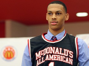 In this Feb. 20, 2018 photo, Darius Bazley wears his new McDonald's All-American Game jersey that was presented to him.