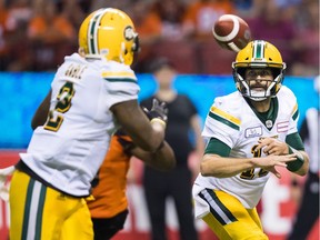 Edmonton Eskimos' quarterback Mike Reilly, right, has the talent to single-handedly spoil the B.C. Lions' playoff-clinching party Friday night at B.C. Place Stadium.