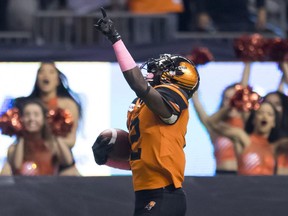 B.C. Lions running back Chris Rainey celebrates his touchdown during CFL football action against the Edmonton Eskimos in Vancouver on Oct. 19, 2018.