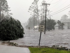 Hurricane Michael formed off the coast of Cuba carrying major Category 4 landfall in the Florida Panhandle. Surge in the Big Bend area, along with catastrophic winds at 155mph. Storm surge floods 20th St in Port St. Joe, Fla., Wednesday, Oct. 10, 2018, after Hurricane Michael makes landfall in the Florida Panhandle.