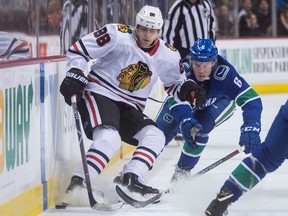 Canucks sophomore winger Brock Boeser (right) should have his hands full if and when he has to deal with Blackhawks superstar Patrick Kane during Wednesday’s NHL game at Rogers Arena.