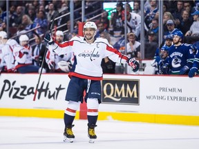 Washington Capitals' Alex Ovechkin, of Russia, celebrates his second goal against the Vancouver Canucks during the third period.