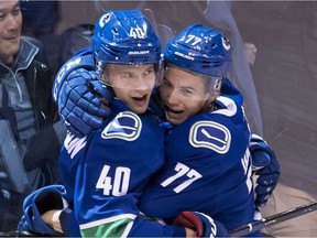 Nikolay Goldobin (right) had his creative moments with Elias Pettersson.