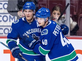 Bo Horvat (left) and rookie Elias Pettersson will be counted on to provide some scoring punch this season for the Vancouver Canucks, especially on the power play.