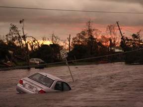 A vehicle sits partially submerged in floodwaters after Hurricane Michael hit in Panama City, Florida, U.S., on Wednesday, Oct. 10, 2018.
