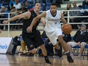 Jadon Cohee drives to the hole for the UBC Thunderbirds against Laval during October exhibition action in Vancouver.