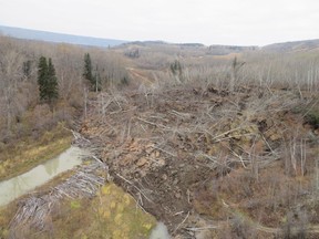 A temporary road is expected to be completed within three weeks for residents of the small northern B.C. community of Old Fort who were forced out of their homes by a slow-moving landslide.