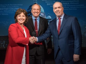 FILE PHOTO : From left, B.C. Liberal Leader Christy Clark, Green party Leader Andrew Weaver and NDP Leader John Horgan pose before the televised leaders debate on April 26, 2017.