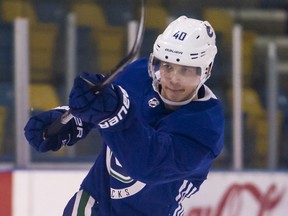 Vancouver Canucks rookie Elias Pettersson shoots the puck during an Oct. 1 practice at UBC.