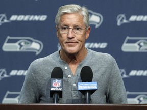 Seattle Seahawks head coach Pete Carroll talks to reporters on Tuesday, Oct. 16, 2018, at Seahawks headquarters in Renton, Wash., reflecting on the life of team owner Paul Allen, who died Monday.