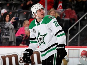 Antoine Roussel has yet to see action with Vancouver after a trade from the Dallas Stars because of an off-season collision that left him with concussion symptoms.