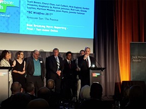 A Postmedia team of news reporters and photographers accept the award for Best Breaking News Reporting in the print/text-based online category for their exhaustive coverage of the 2017 wildfires in B.C.