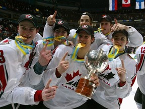 Members of Team Canada celebrate their victory against Team Russia during the gold medal game at the World Junior Hockey Championships at General Motors Place on January 5, 2006 in Vancouver, British Columbia, Canada.  Team Canada defeated Team Russia 5-0 to win the gold medal.