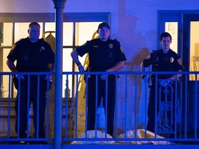 Tallahassee Police officers are stationed outside the HotYoga Studio after a gunman killed one person and injured several others inside on November 2, 2018 in Tallahassee, Florida. The gunman also died from what appears a self inflicted gunshot wound according to police.