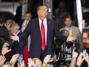 U.S. President Donald Trump arrives at a campaign rally at the Pensacola International Airport on November 3, 2018 in Pensacola, Florida.