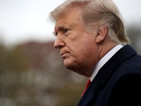 U.S. President Donald Trump answers questions from the press while departing the White House on November 26, 2018 in Washington, DC.