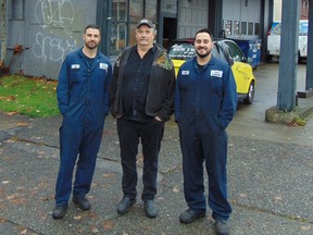 Doug Borden, who spent 35 years rebuilding engines at Alec’s Automotive, flanked by sons Rob and Kevin who now run the shop. After 70 years, the shop is leaving its Vancouver location for Burnaby.