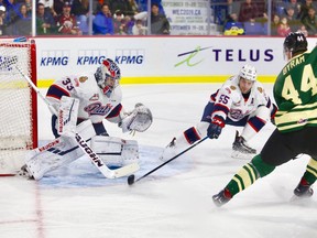 Vancouver Giants defenceman Bowen Byram drives to the net against the Regina Pats on Friday at the Langley Events Centre. The Giants were wearing special 1946 White Spot retro jerseys.