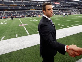 Kansas City Chiefs general manager Brett Veach shakes hands with a fan before a National Football League game against the Dallas Cowboys in Arlington, Texas, in November 2017.
