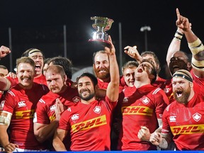 Canadian team players celebrate after their victory in 2019 Japan Rugby Union World Cup qualifying match between Hong Kong and Canada at The Delort Stadium in Marseille, southern France on November 23, 2018.