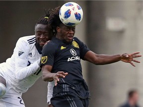 Heading a soccer ball repeatedly — like Vancouver Whitecap Kei Kamara (left) and Columbus Crew’s Lalas Abubakar are vying to do here in a MLS game earlier this season — can be bad for your health.