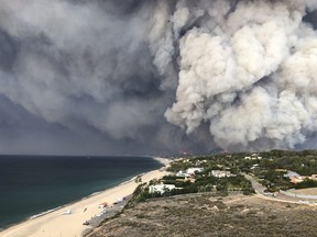 Smoke from the wildires fills the air in Malibu, Calif.
