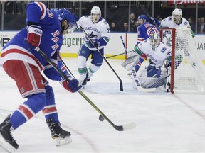 Ryan Spooner prepares to test Jacob Markstrom while with the Rangers earlier this season.