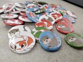 Are you #TeamOtter or #TeamKoi? Now you can wear your affiliation in the form of a button.