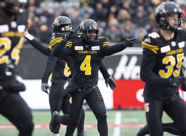 Hamilton Tiger-Cats defensive back Richard Leonard (4) celebrates with his teammates after the defence stopped the B.C. Lions on third down during first half CFL Football division semifinal game action in Hamilton, Ont. on Sunday, November 11, 2018.