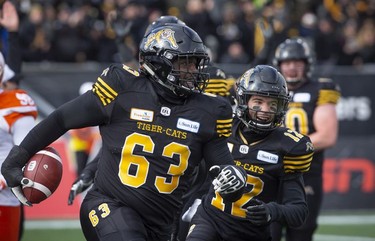 Hamilton Tiger-Cats fullback Kelvin Palmer (63) celebrates his fumble recovery touchdown during first half CFL Football division semifinal game action against the B.C. Lions in Hamilton, Ont. on Sunday, November 11, 2018.