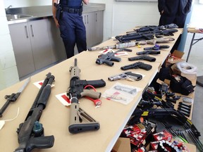 FILE PHOTO: Drugs, weapons, ammunition, cash and vehicles were seized as a result of Project Trooper and put on display Wednesday by the Vancouver police department.