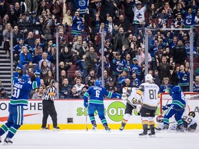 Vancouver Canucks' Brock Boeser appeals to referee Gord Dwyer to call the goal after he put a shot past Vegas Golden Knights goalie Marc-Andre Fleury during the third period of an NHL hockey game in Vancouver, on Thursday Nov. 29, 2018. Boeser was credited with a goal on the play.