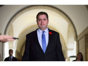 Conservative Leader Andrew Scheer makes his way to speak to media on Parliament Hill, in Ottawa, Wednesday, Nov. 7, 2018.
