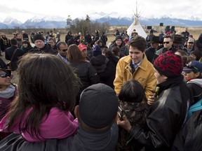 Prime Minister Justin Trudeau greets the people following a ceremony near Chilko Lake, B.C.,Friday, Nov. 2, 2018. The Prime Minister was in the area to apologize to the Tsilhqot'in community for the hangings of six chiefs during the so-called Chilcotin War over 150 years ago.