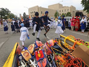The 2017 Sikh Society Parade, celebrating the 413th installation of Sri Guru Granth Sahib Ji, the Sikh sacred scripture, makes its way through downtown Winnipeg on Sun., Sept. 3, 2017.